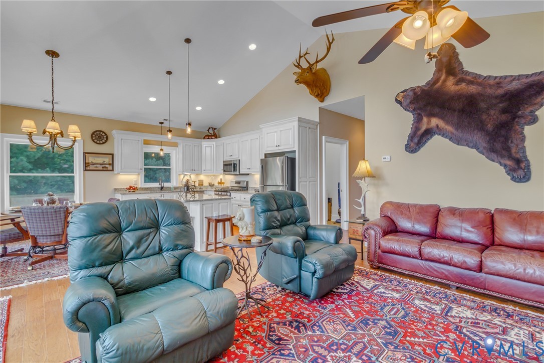 200 Pinetop Road Topping, VA 23169 - Photo 13 of 38 Living room featuring recessed lighting, light woo