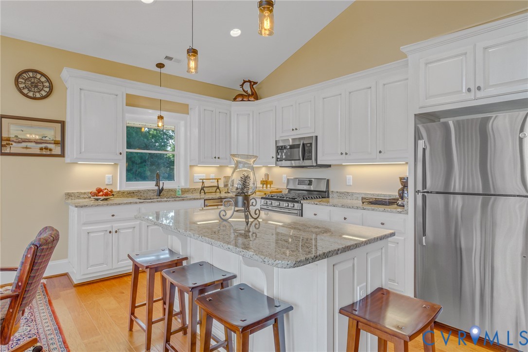 200 Pinetop Road Topping, VA 23169 - Photo 15 of 38 Kitchen featuring stainless steel appliances, loft