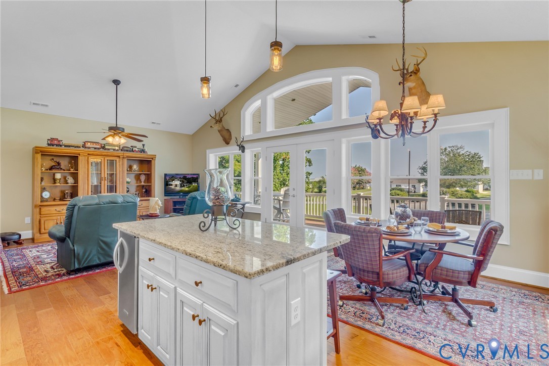 200 Pinetop Road Topping, VA 23169 - Photo 17 of 38 Kitchen with french doors, white cabinets, light w