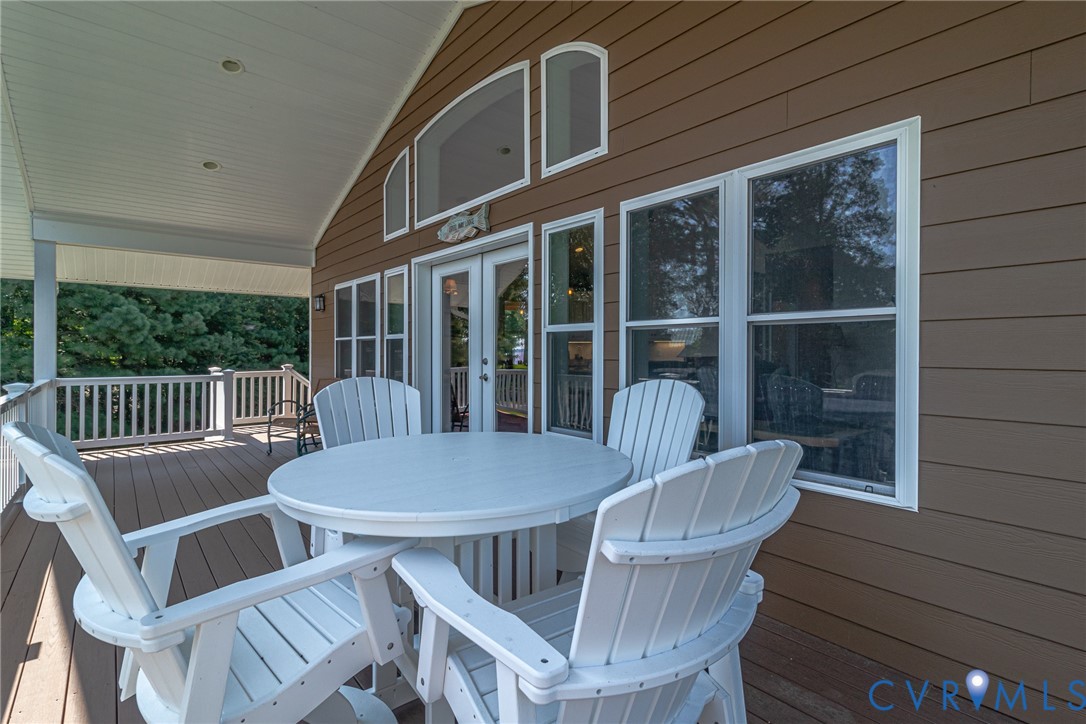 200 Pinetop Road Topping, VA 23169 - Photo 9 of 38 Deck upstairs with outdoor dining area