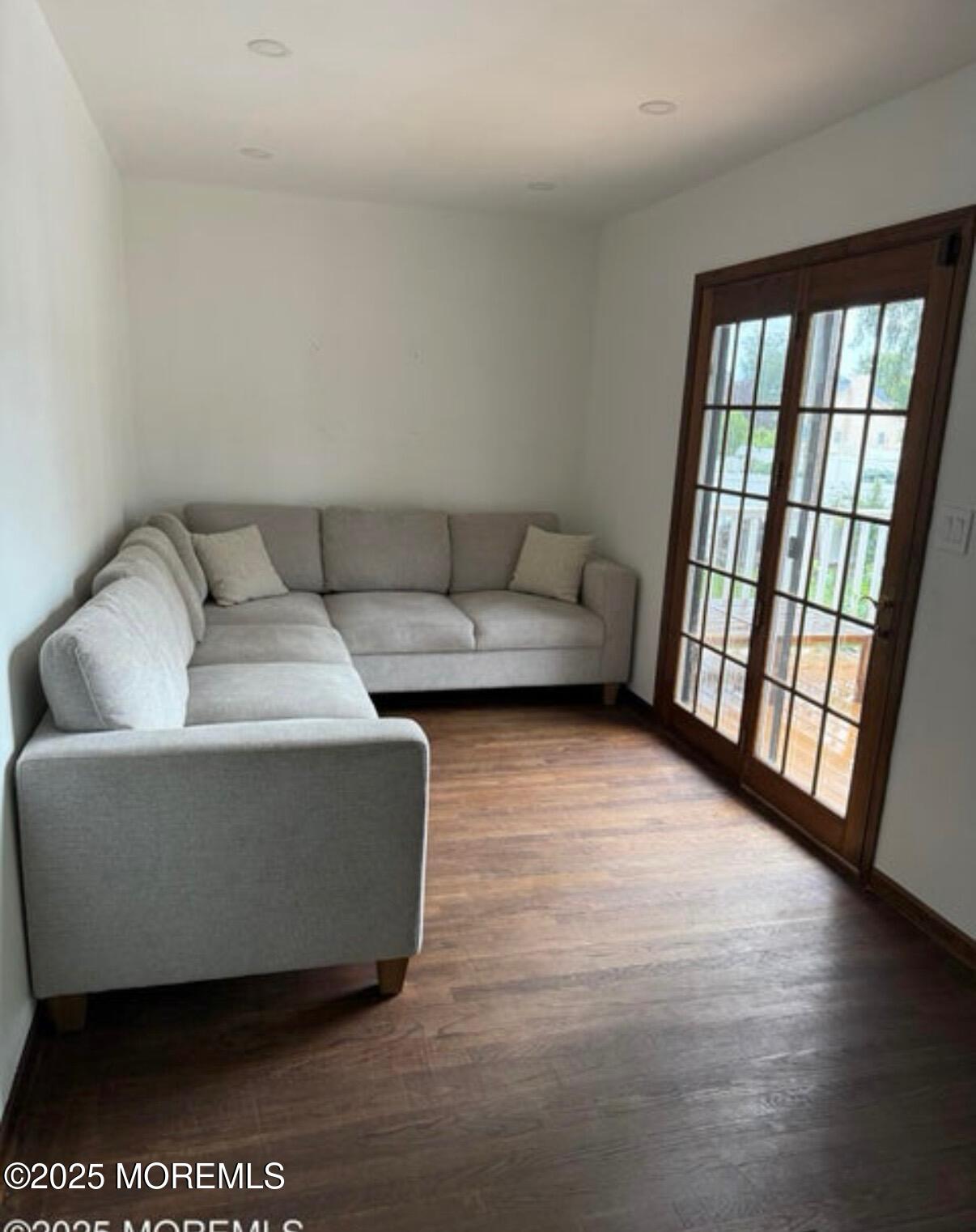 530 Wall Street Eatontown, NJ 07724 - Photo 5 of 13 a living room with furniture and a large window