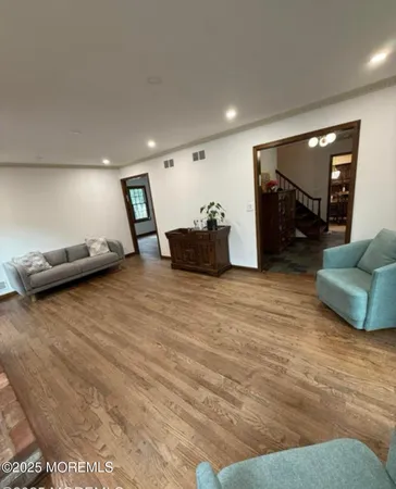 a living room with furniture and a couch