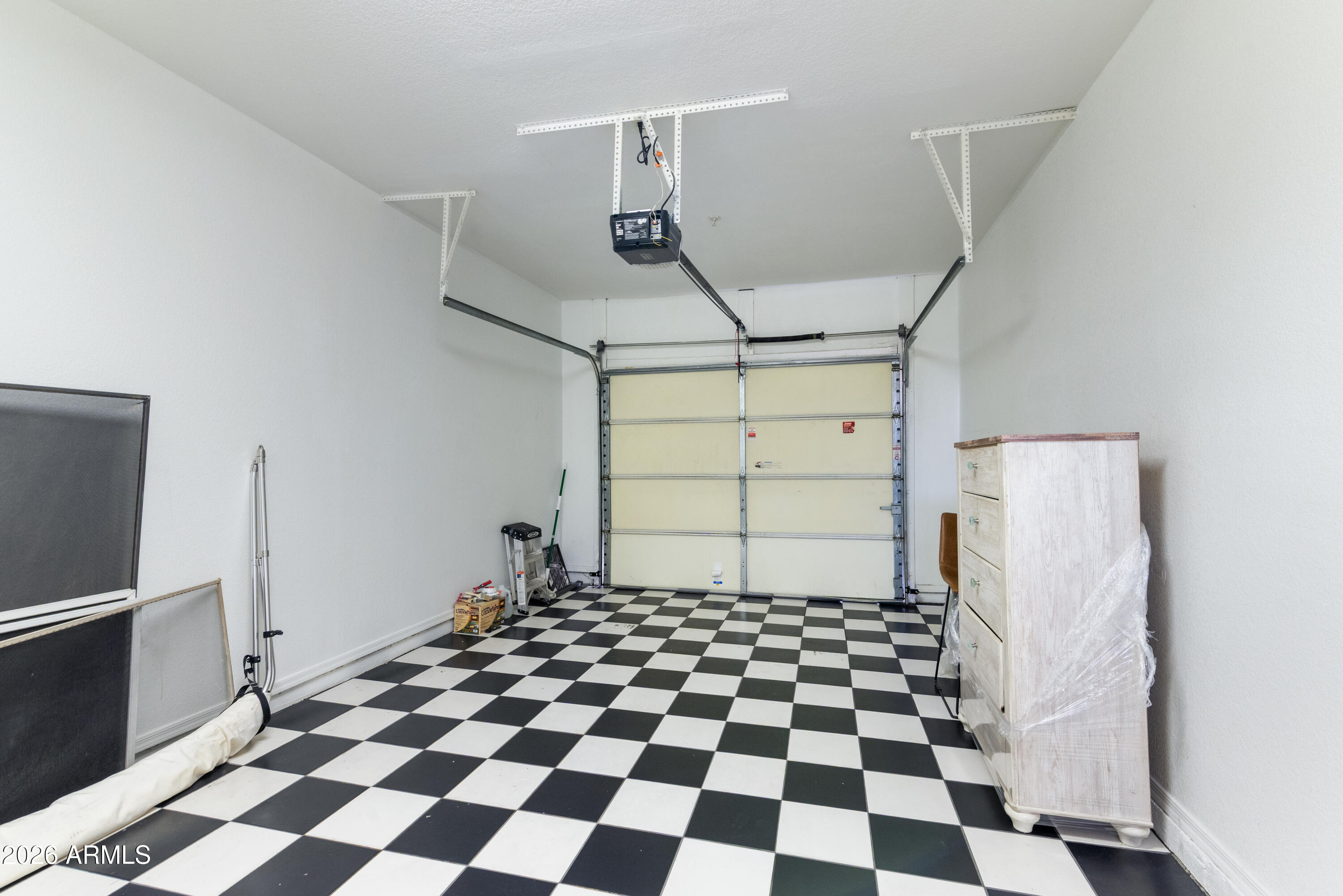 2992 North Miller Road, Unit A212 Scottsdale, AZ 85251 - Photo 19 of 25 Attached Garage with Finished Floor