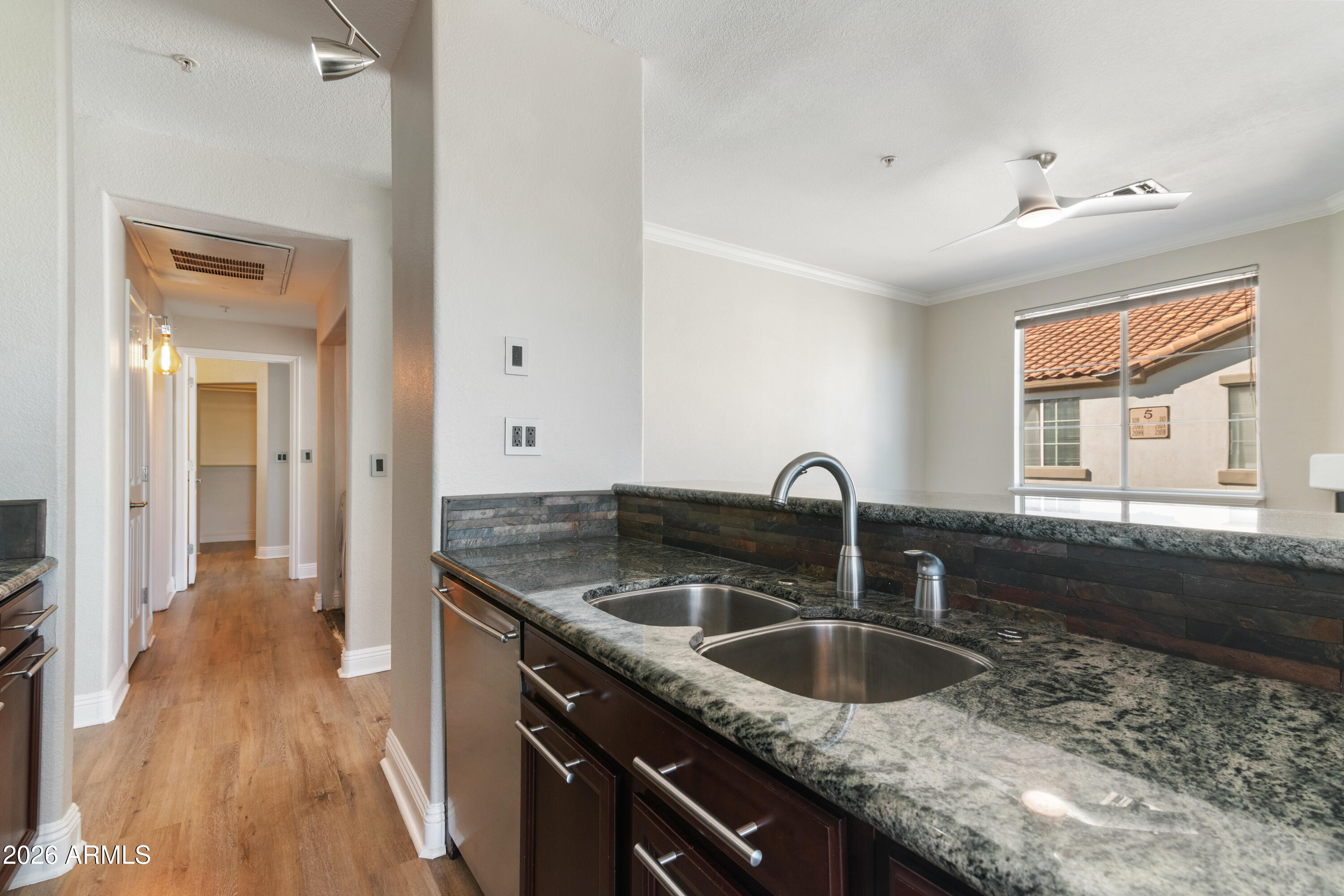 2992 North Miller Road, Unit A212 Scottsdale, AZ 85251 - Photo 5 of 25 Kitchen Island with Dual Sink
