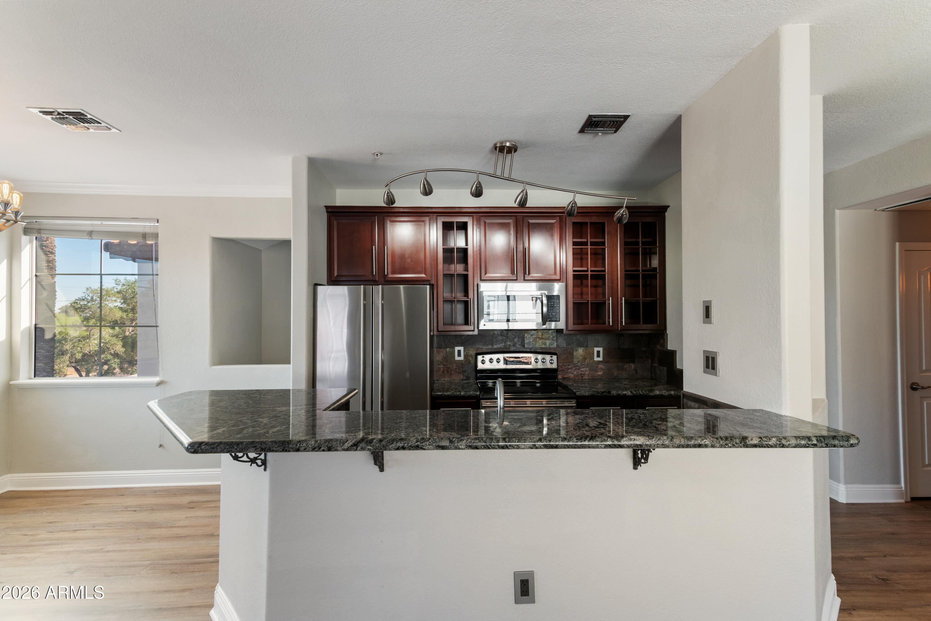 2992 North Miller Road, Unit A212 Scottsdale, AZ 85251 - Photo 6 of 25 Kitchen Island