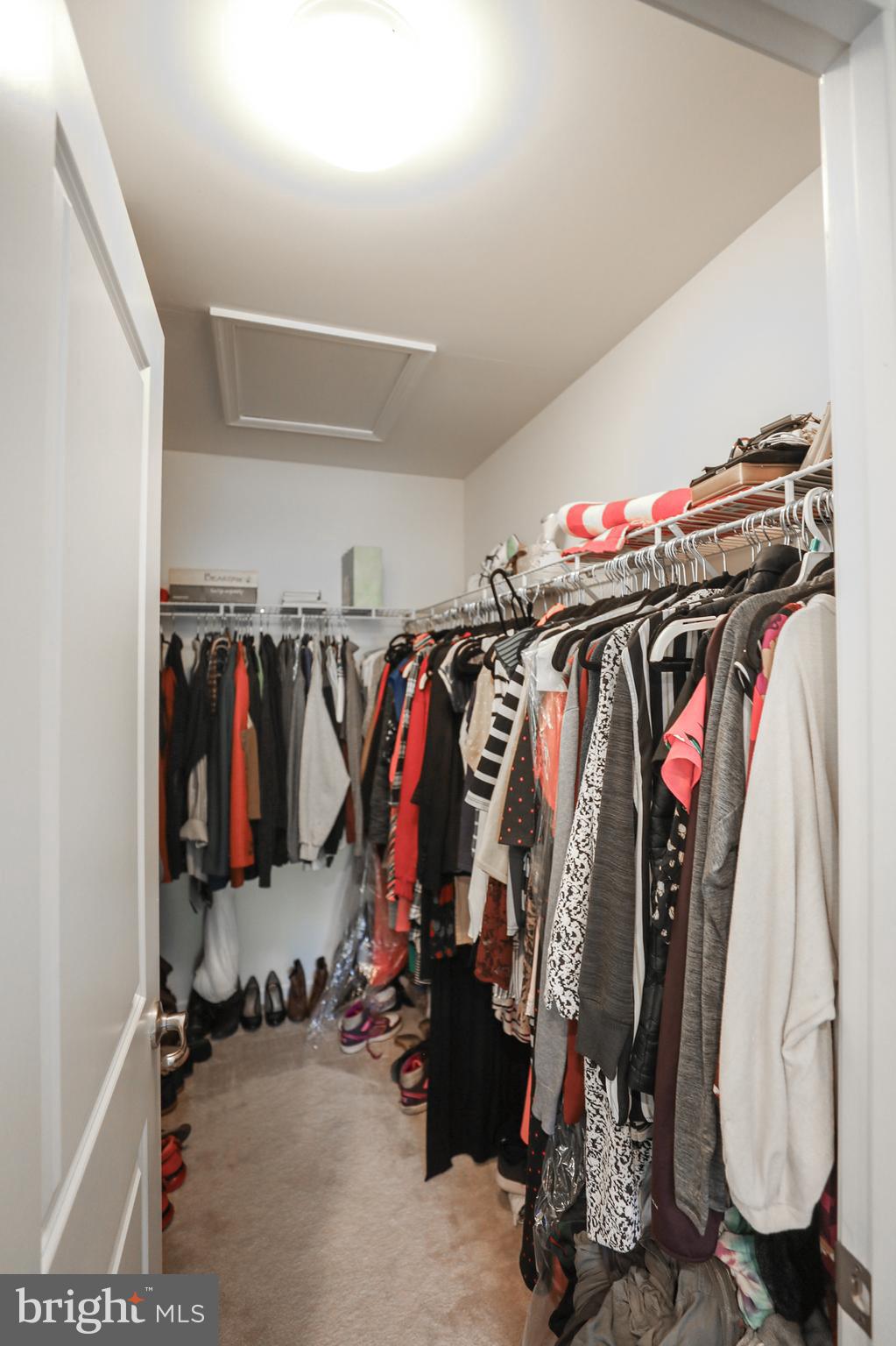 1024 Cook Drive Southeast Washington, DC 20032 - Photo 21 of 44 a view of walk in closet with clothes