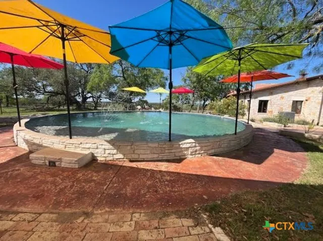 a view of a yard with ocean view