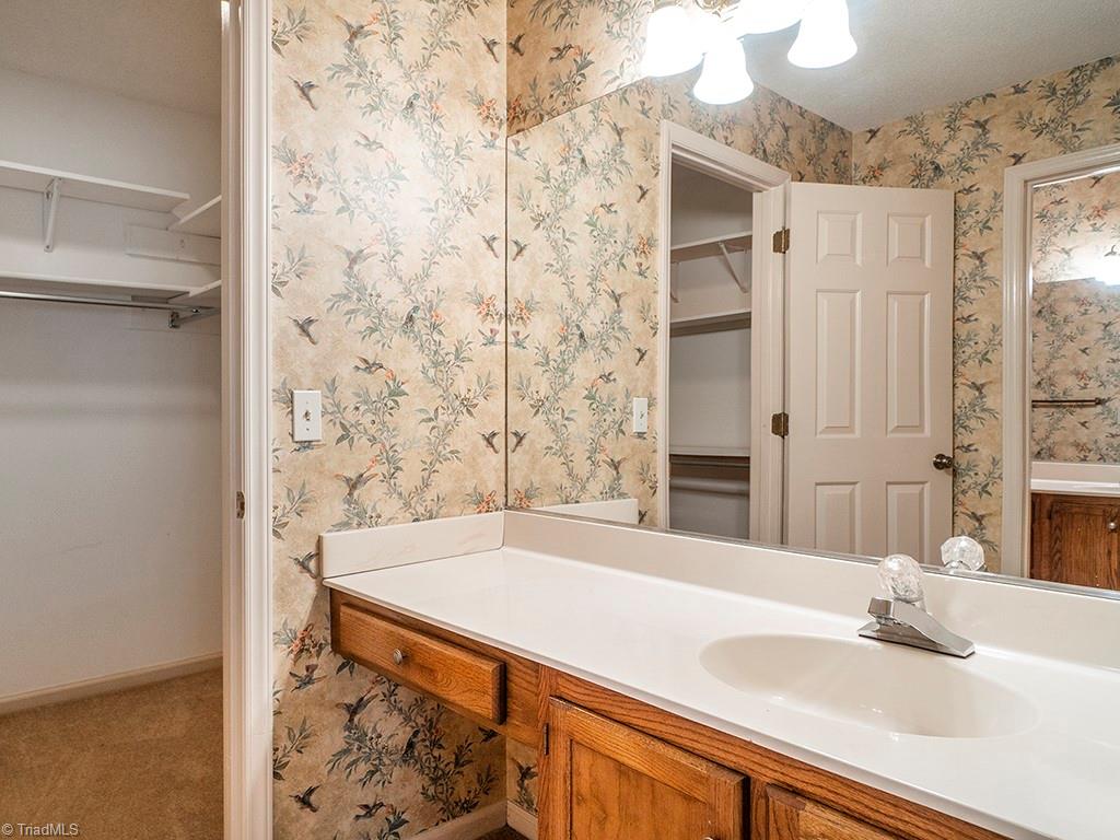 169 Old Mill Road, Unit D High Point, NC 27265 - Photo 14 of 24 Primary bath with separate vanities and walk in closet!