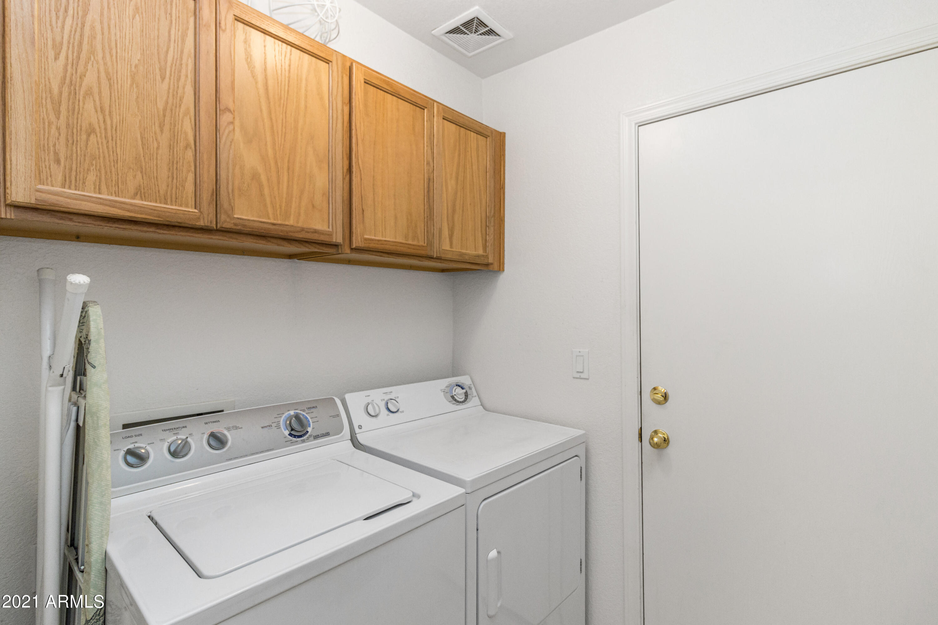 625 East Rancho Viejo Loop Casa Grande, AZ 85122 - Photo 22 of 26 Laundry room with cabinets