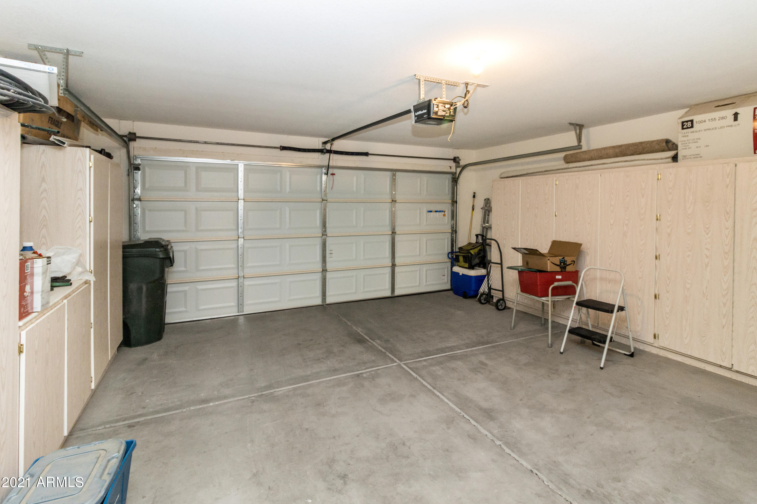 625 East Rancho Viejo Loop Casa Grande, AZ 85122 - Photo 23 of 26 2-car garage with storage