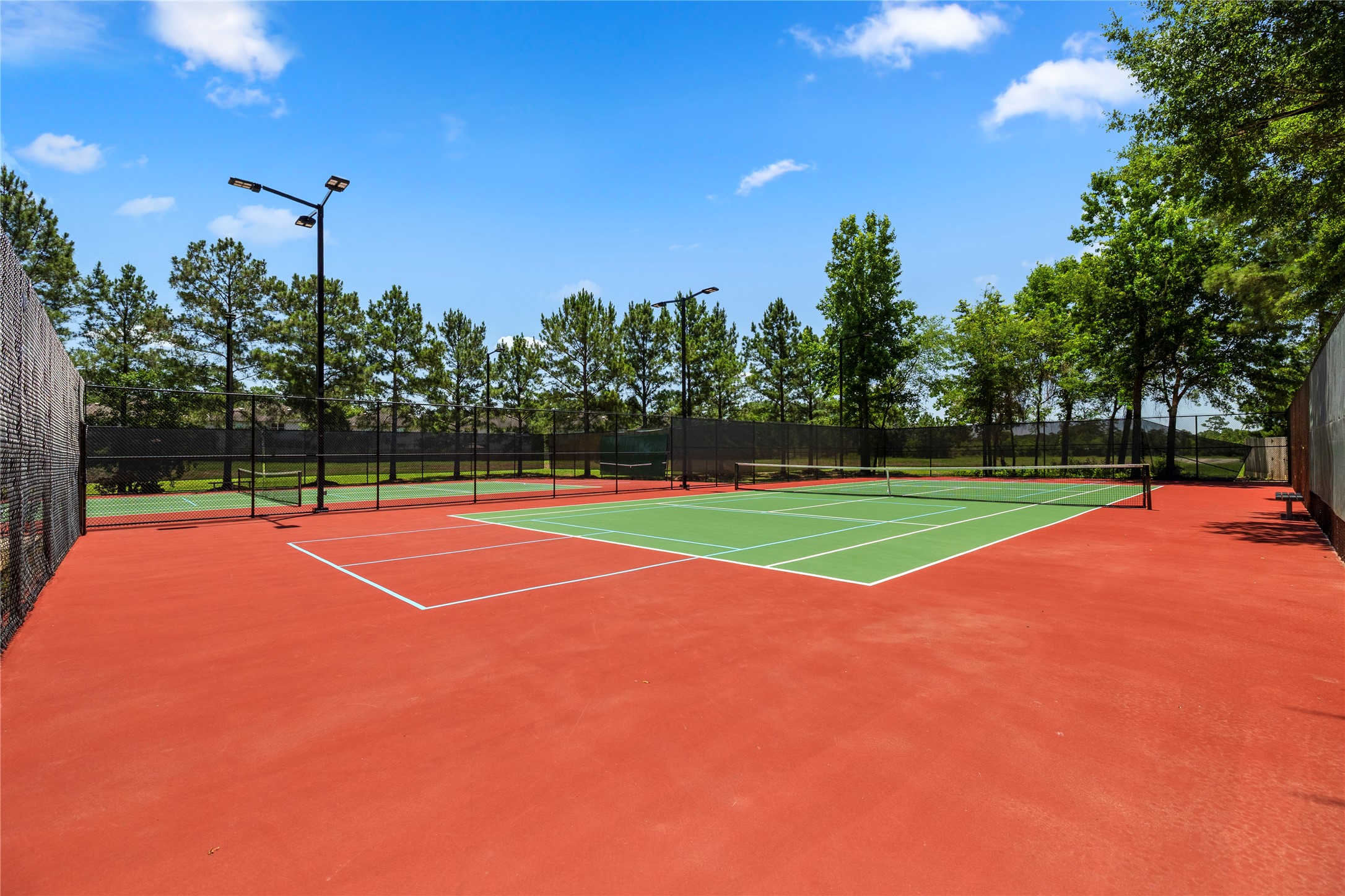 26 Winhall Place The Woodlands, TX 77354 - Photo 46 of 49 May Valley Park with tennis courts and play area for the entire family.
