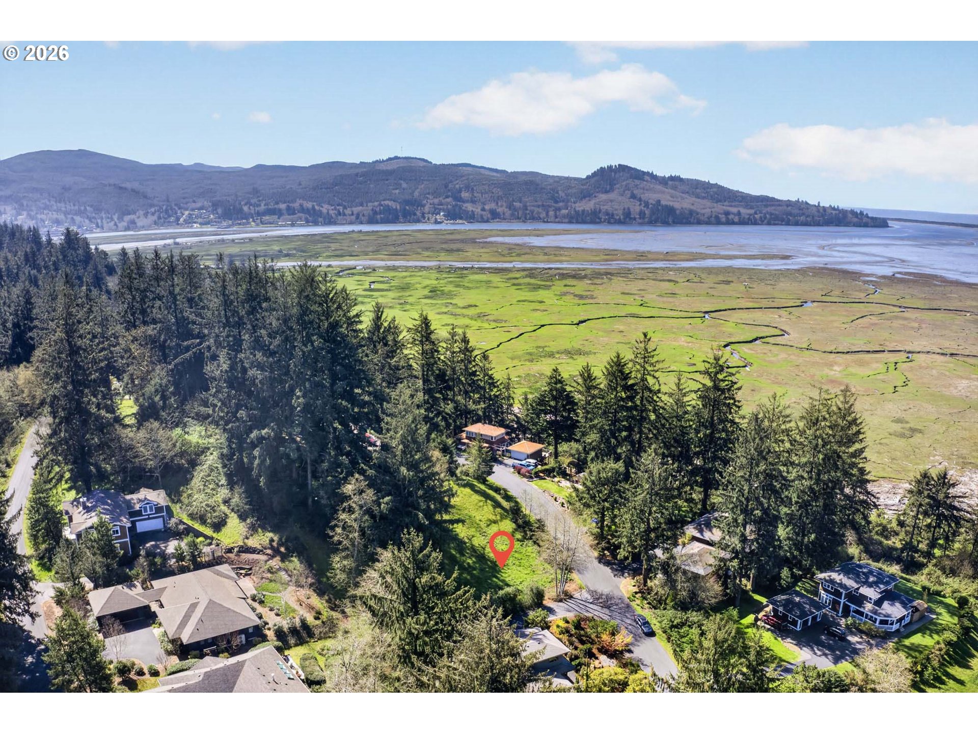 34775 Bay Loop Road Nehalem, OR 97131 - Photo 10 of 10 a view of lake with mountain