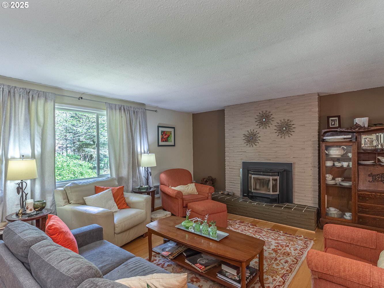 50010 Southeast Coalman Road Sandy, OR 97055 - Photo 11 of 48 a living room with furniture and a fireplace