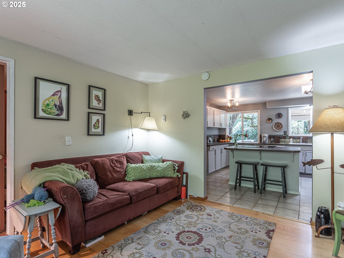 50010 Southeast Coalman Road Sandy, OR 97055 - Photo 19 of 48 a living room with a couch and a coffee table