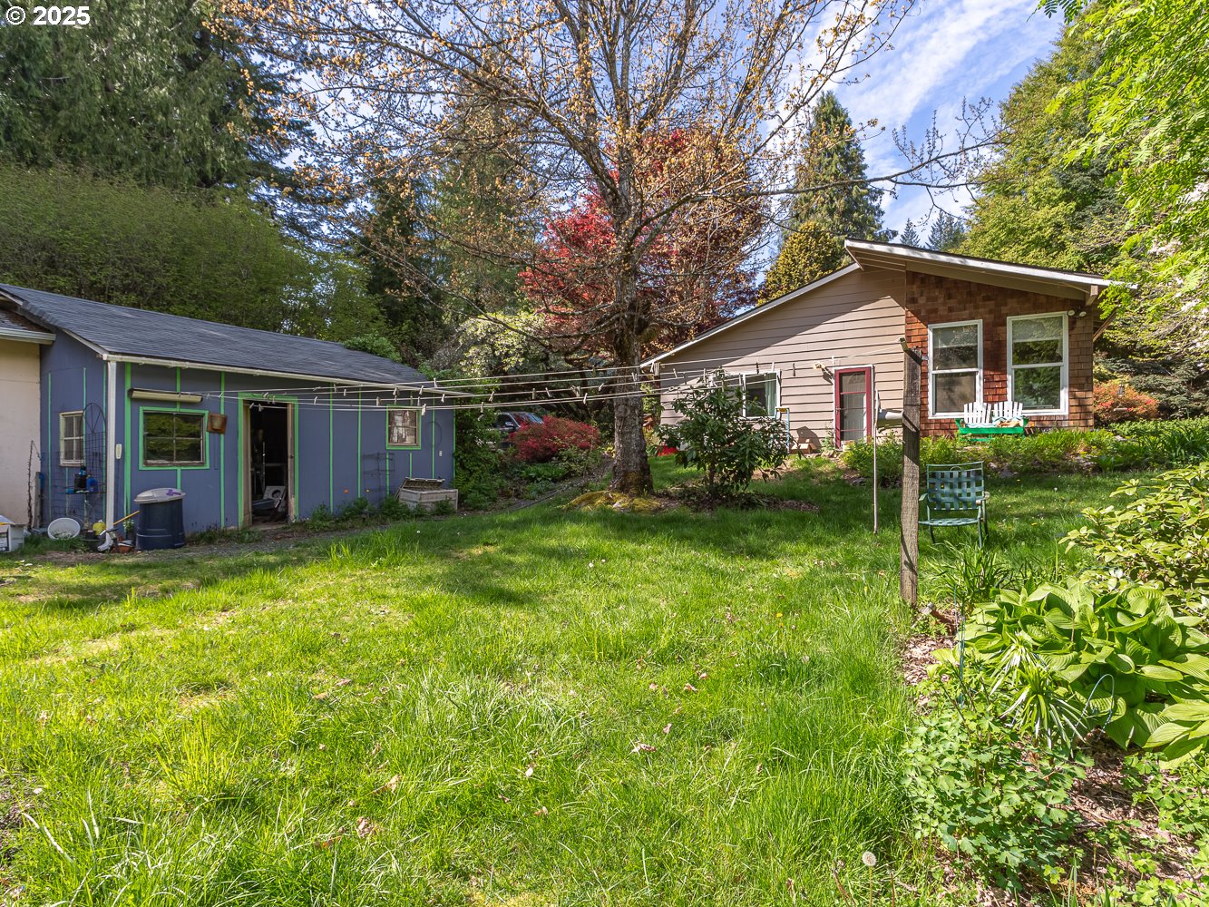 50010 Southeast Coalman Road Sandy, OR 97055 - Photo 37 of 48 a view of a house with backyard and garden