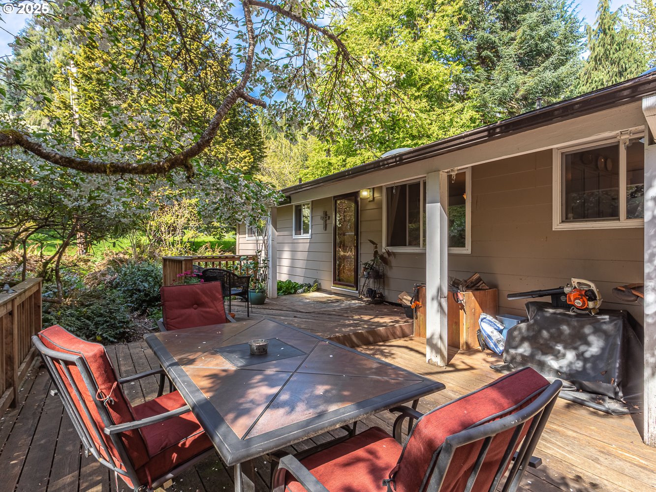 50010 Southeast Coalman Road Sandy, OR 97055 - Photo 6 of 48 a backyard of a house with seating space