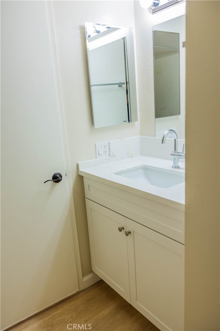 1219 Edwards Street, Unit 33 Redlands, CA 92374 - Photo 24 of 55 a bathroom with a sink and a mirror