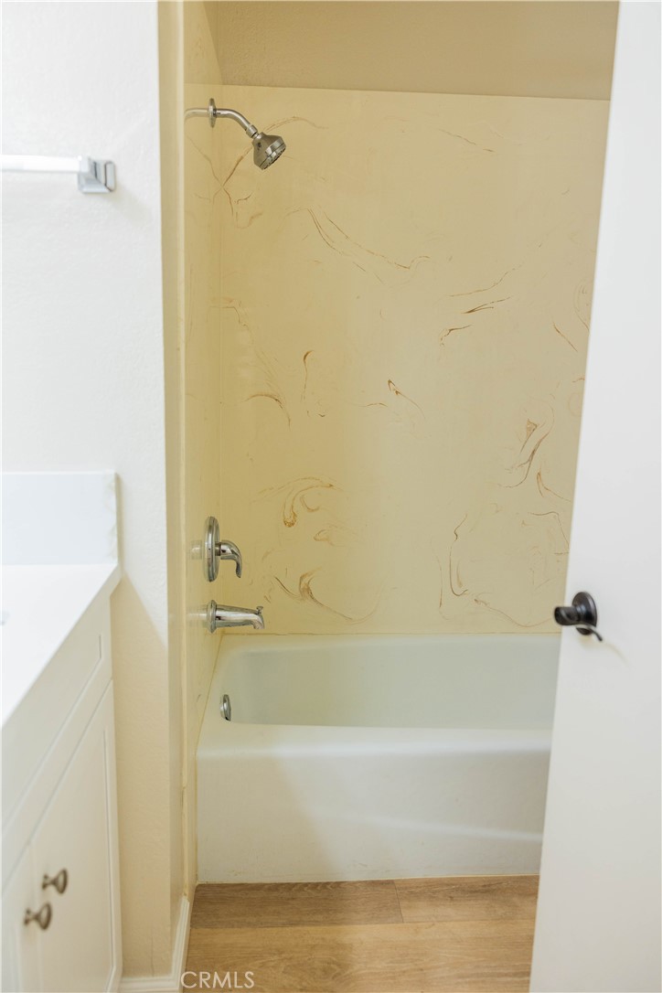 1219 Edwards Street, Unit 33 Redlands, CA 92374 - Photo 26 of 55 a bathroom with a bathtub