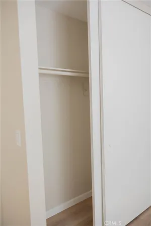 a kitchen with sink stove and refrigerator