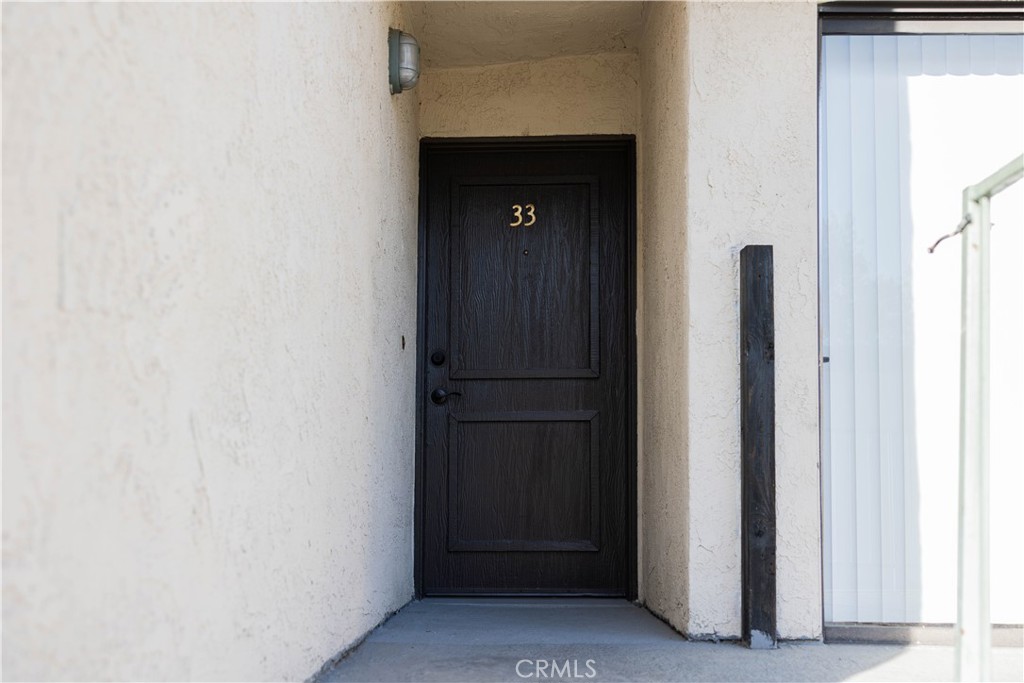 1219 Edwards Street, Unit 33 Redlands, CA 92374 - Photo 4 of 55 a view of front door