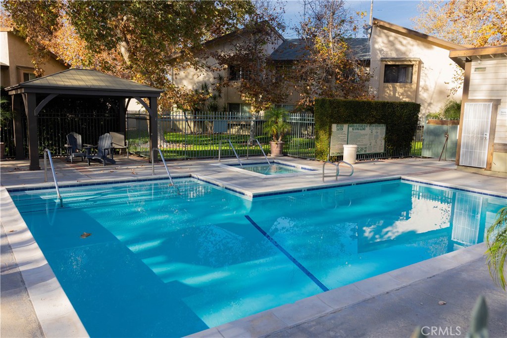 1219 Edwards Street, Unit 33 Redlands, CA 92374 - Photo 50 of 55 a view of a house with sitting area and garden