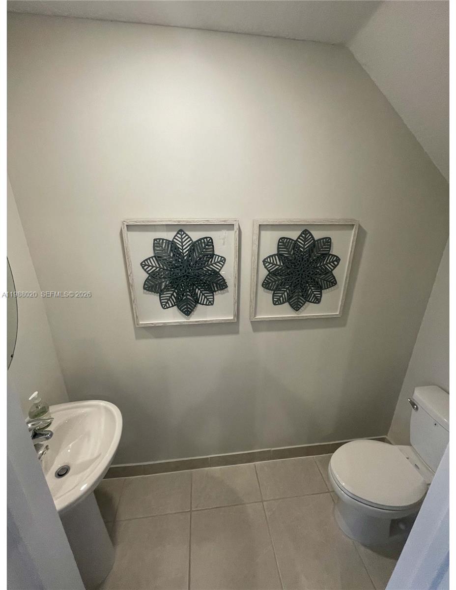 1879 Southeast 27th Street Homestead, FL 33035 - Photo 10 of 10 a bathroom with a toilet