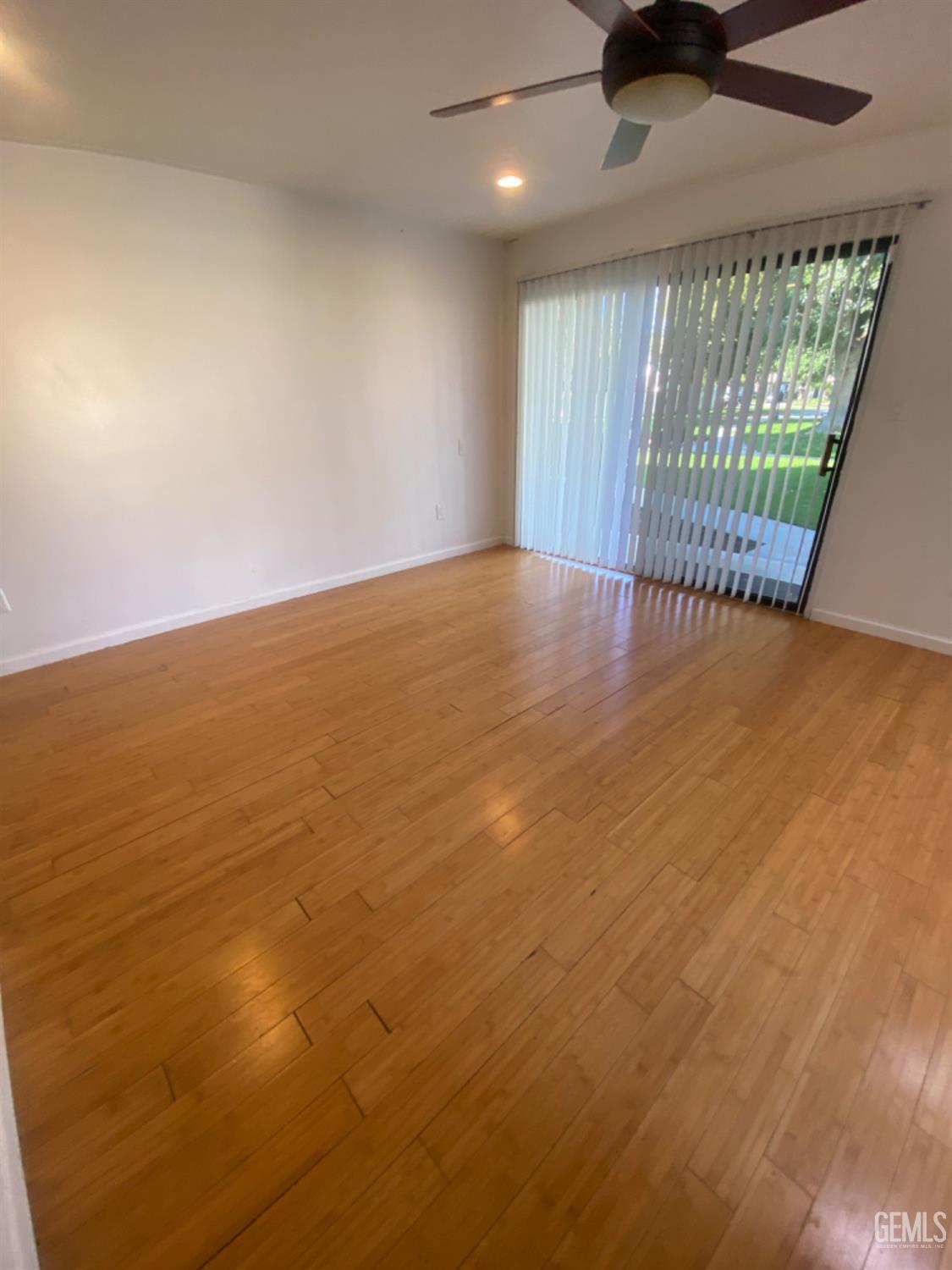 Undisclosed Address Bakersfield, CA 93309 - Photo 13 of 31 an empty room with floor to ceiling window