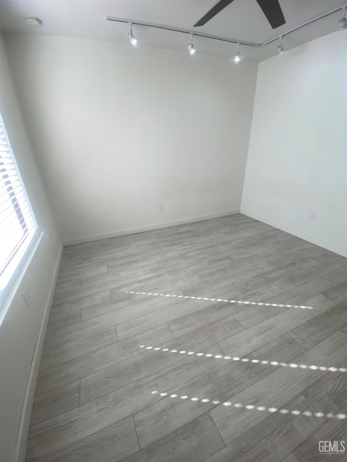 Undisclosed Address Bakersfield, CA 93309 - Photo 23 of 31 a view of an empty room with a window