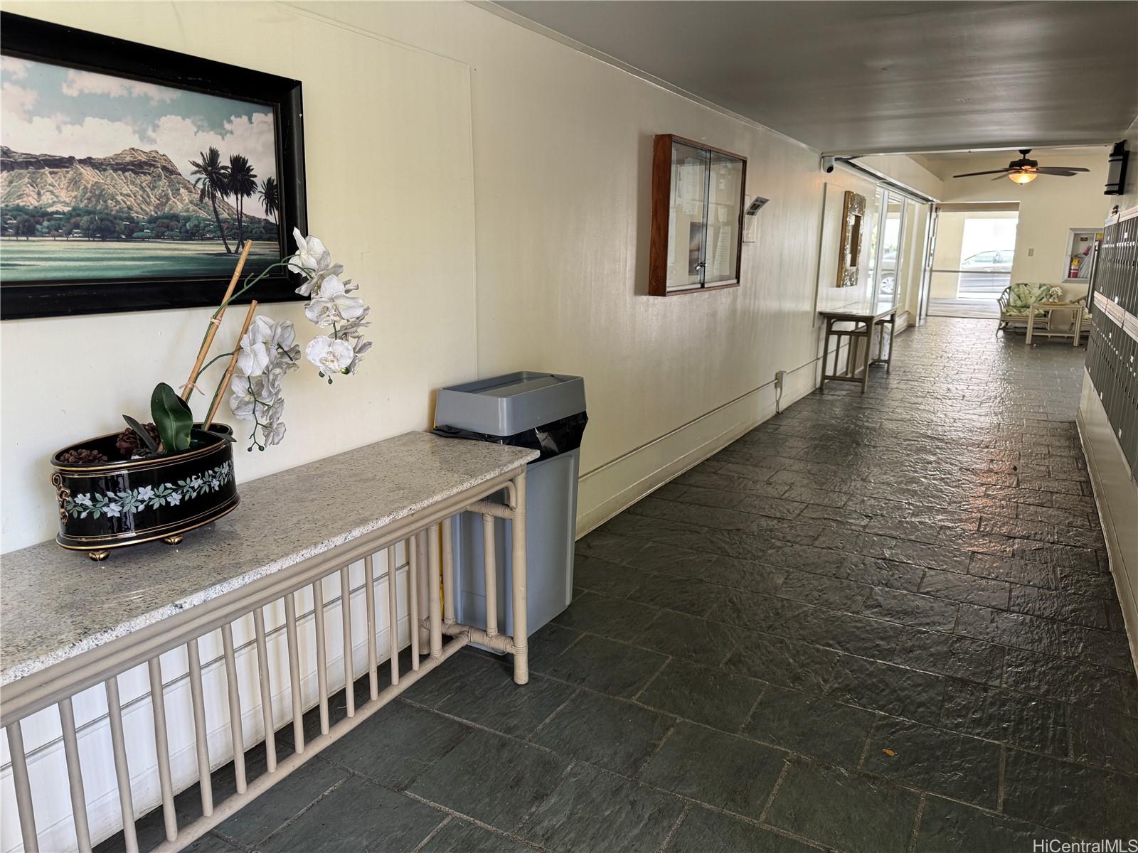 2085 Ala Wai Boulevard, Unit B94 Honolulu, HI 96815 - Photo 20 of 23 a view of a porch with furniture and floor to ceiling window