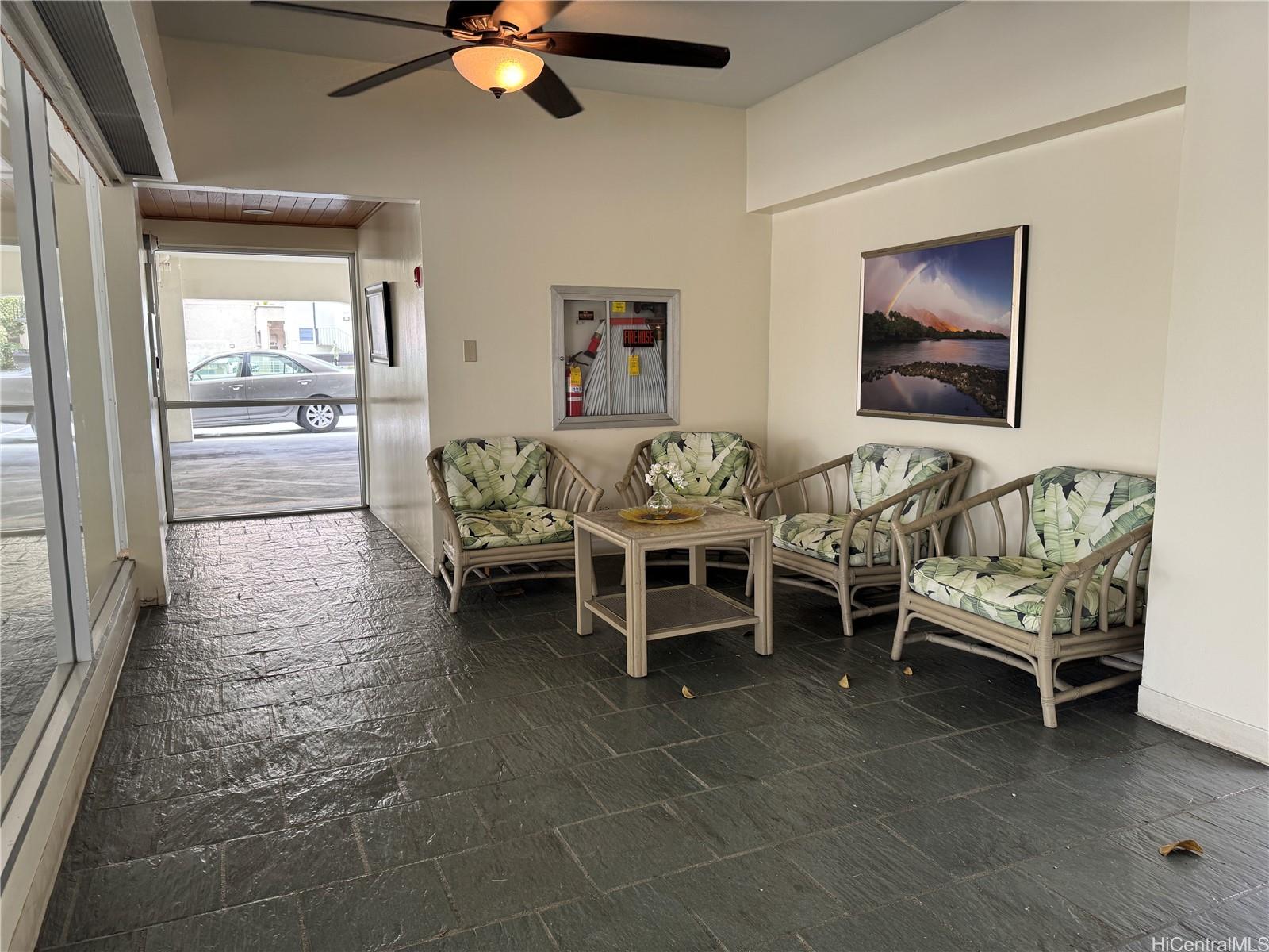 2085 Ala Wai Boulevard, Unit B94 Honolulu, HI 96815 - Photo 21 of 23 a dining room with furniture and window