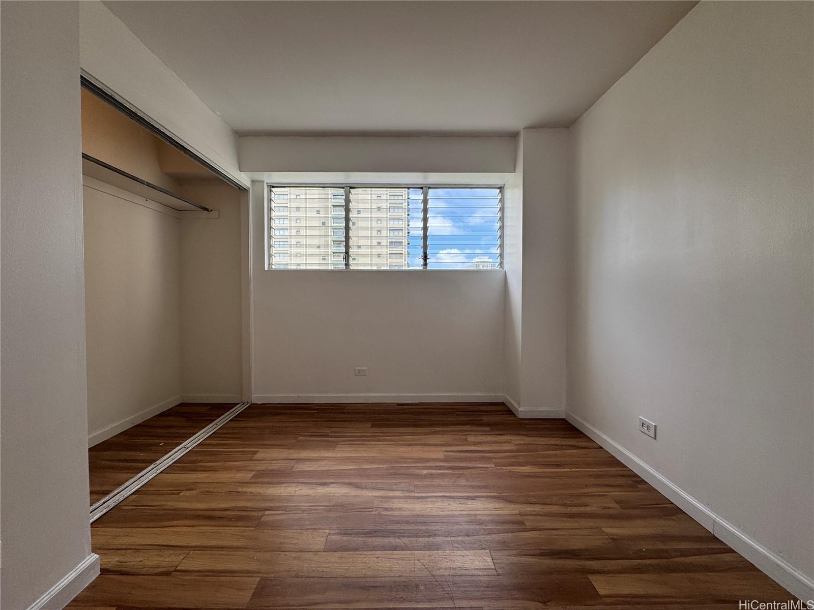 2085 Ala Wai Boulevard, Unit B94 Honolulu, HI 96815 - Photo 6 of 23 wooden floor in an empty room