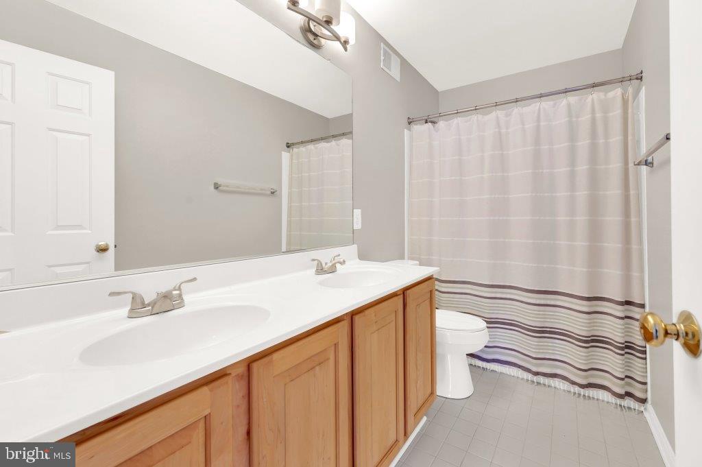 1719 Dixie Line Road Elkton, MD 21921 - Photo 24 of 30 Second Full Bath with Double Vanity and Tub/Shower