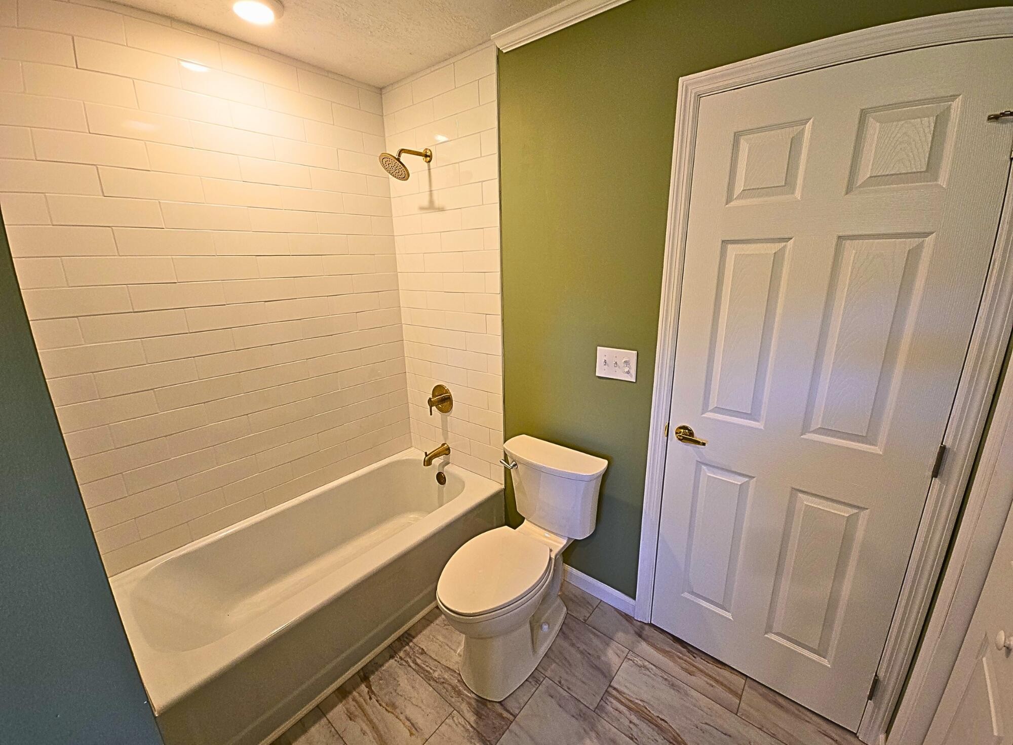 858 Main Street Decatur, TN 37322 - Photo 19 of 47 a bathroom with a toilet and a shower