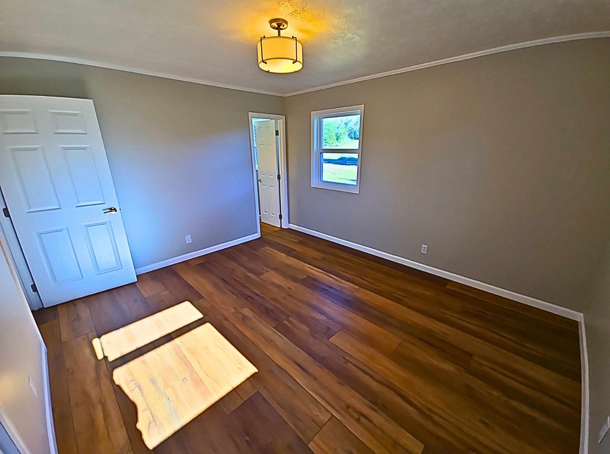 858 Main Street Decatur, TN 37322 - Photo 21 of 47 a view of empty room with windows