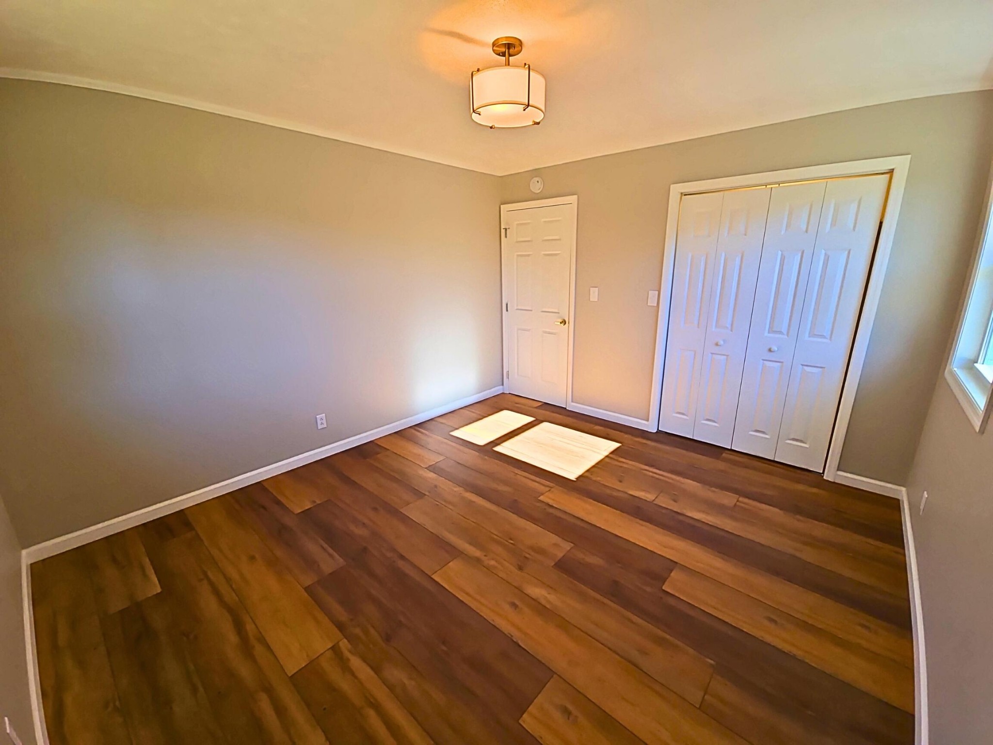 858 Main Street Decatur, TN 37322 - Photo 24 of 47 a view of a room with wooden floor and white walls