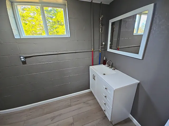 a view of a house with pool yard and outdoor seating