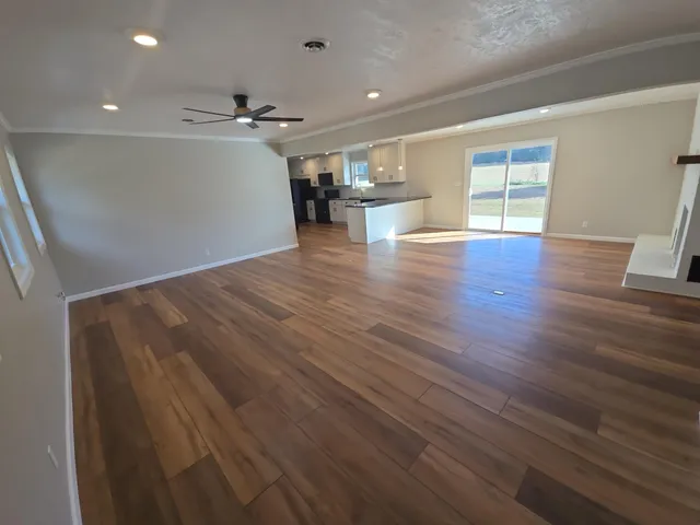 a bathroom with a sink a mirror and a window