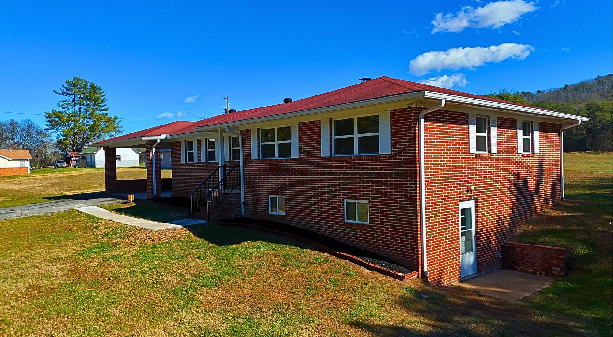 858 Main Street Decatur, TN 37322 - Photo 6 of 47 a view of a house with a yard