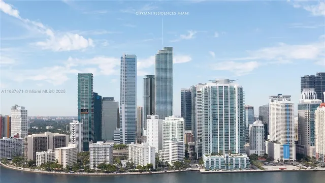 a view of a city with tall buildings