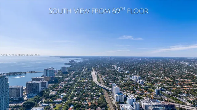 a view of a city with an ocean view