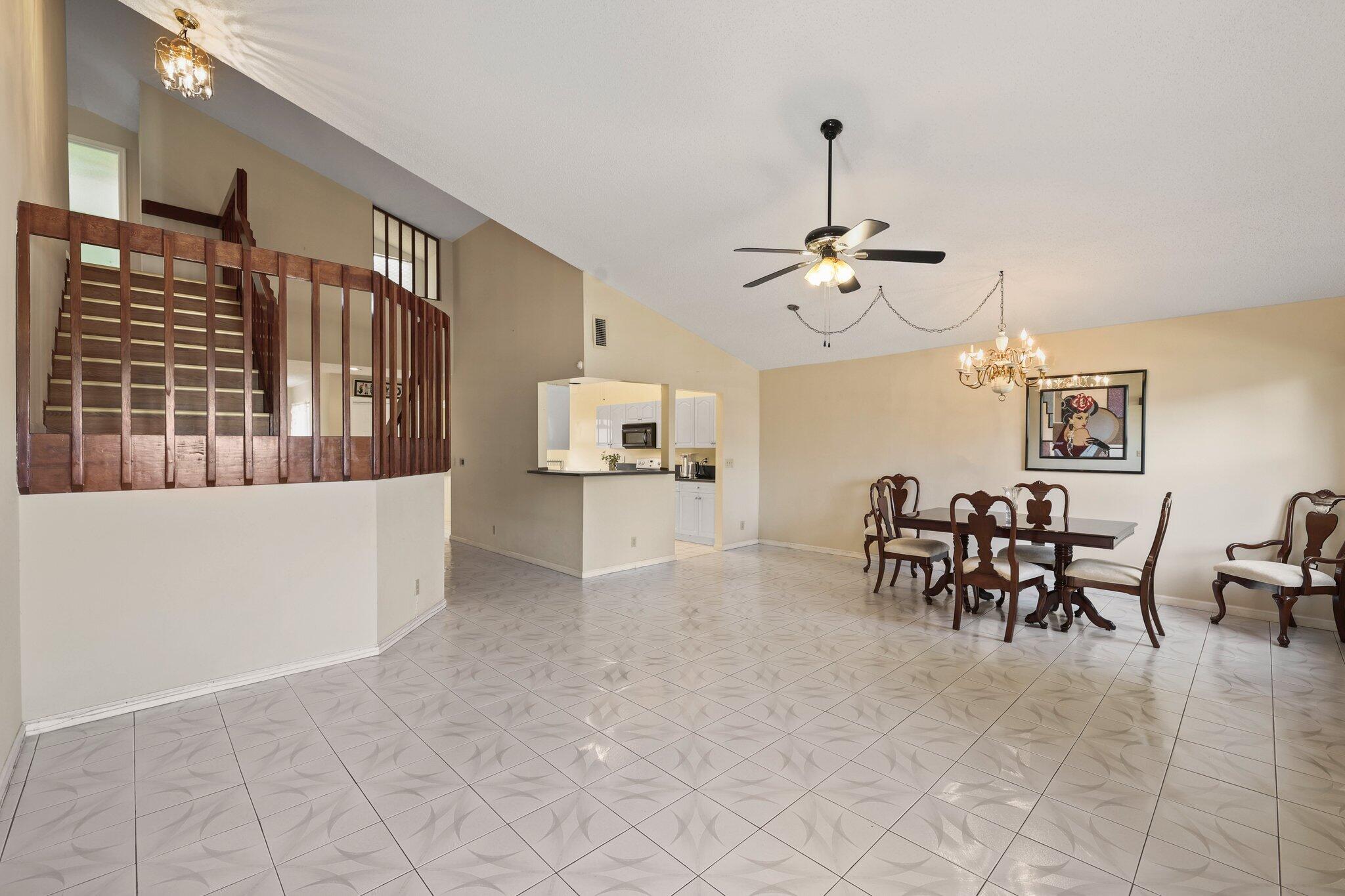 1235 Northwest 19th Terrace Delray Beach, FL 33445 - Photo 12 of 45 a view of a livingroom with furniture and a window