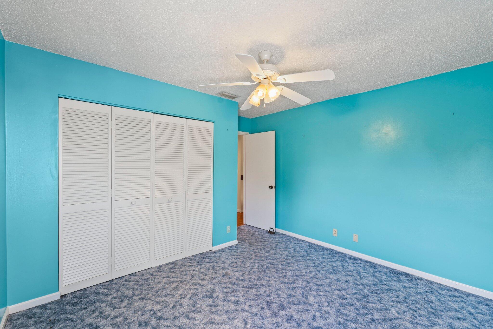 1235 Northwest 19th Terrace Delray Beach, FL 33445 - Photo 18 of 45 a view of a big room with carpet