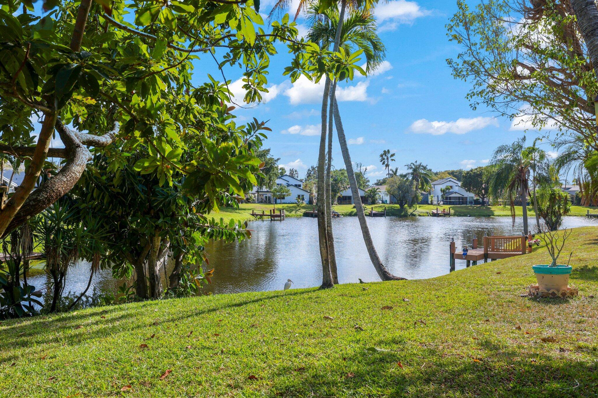 1235 Northwest 19th Terrace Delray Beach, FL 33445 - Photo 31 of 45 a lake view with a lake