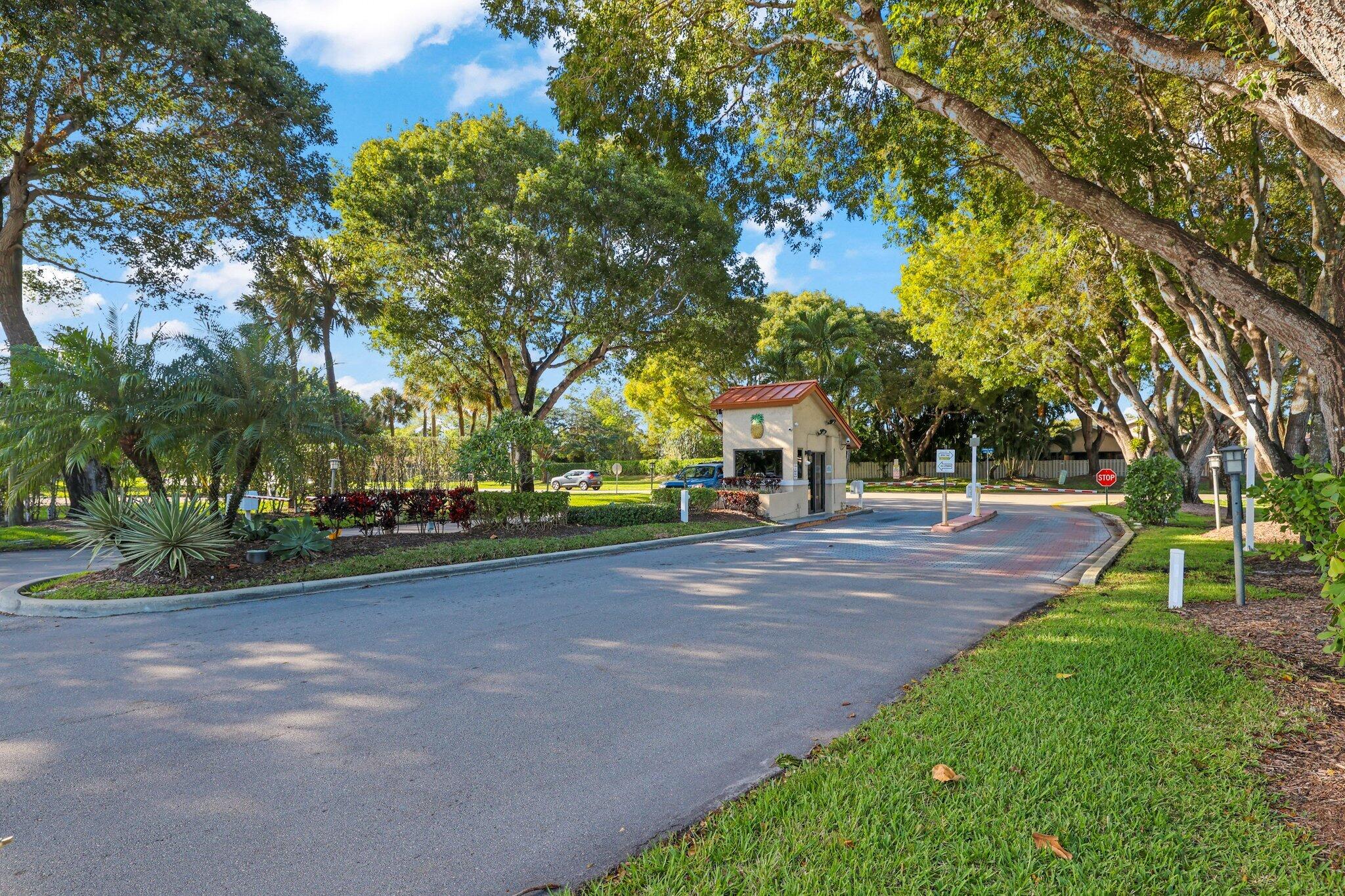 1235 Northwest 19th Terrace Delray Beach, FL 33445 - Photo 34 of 45 a view of a park with large trees