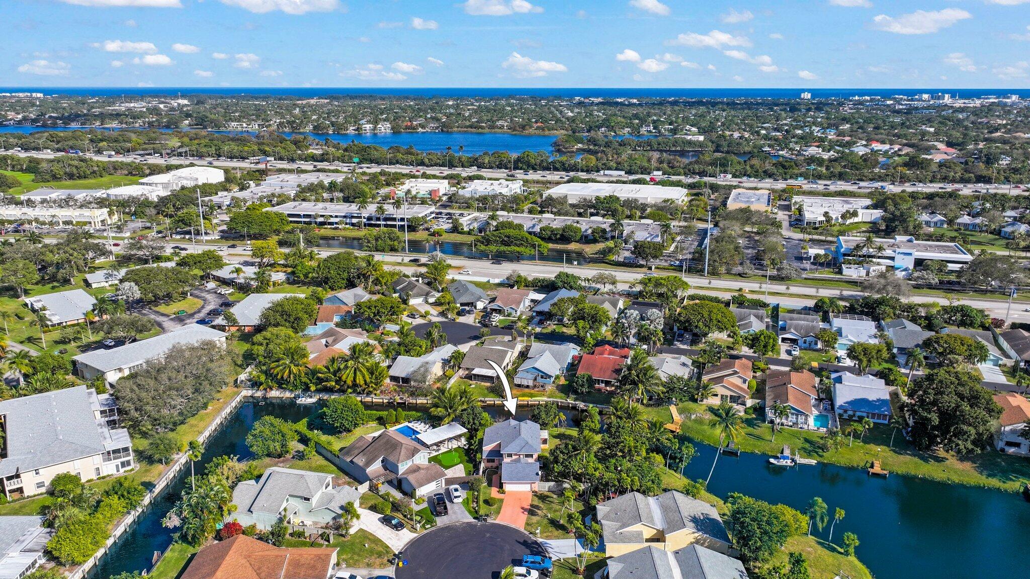1235 Northwest 19th Terrace Delray Beach, FL 33445 - Photo 44 of 45 an aerial view of a city