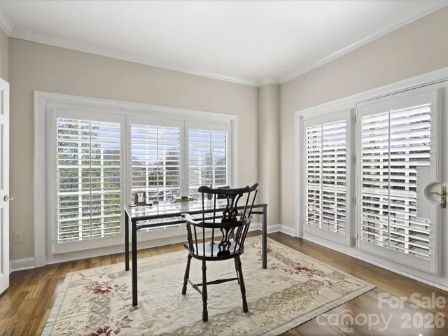 a view of a livingroom with furniture and wooden floor