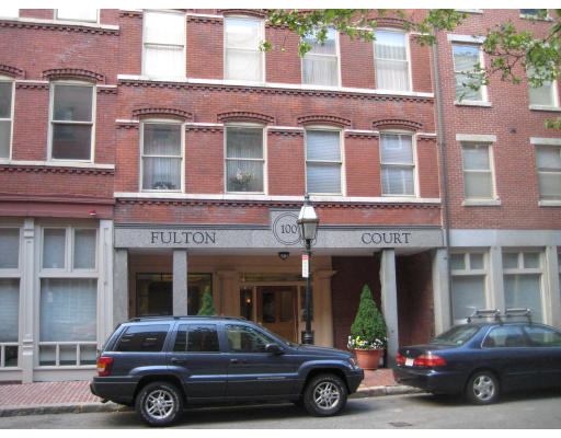 100 Fulton Street, Unit 3C Boston, MA 02109 - Photo 1 of 6 a car parked in front of a building