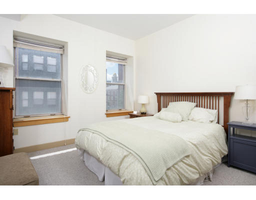 100 Fulton Street, Unit 3C Boston, MA 02109 - Photo 3 of 6 a bedroom with a bed and with large windows
