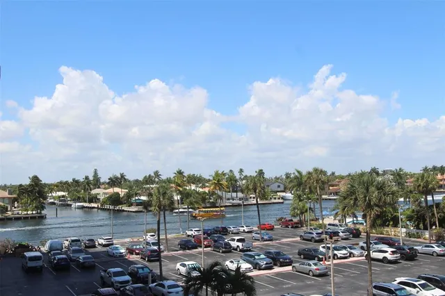 a view of a swimming pool and lounge chair