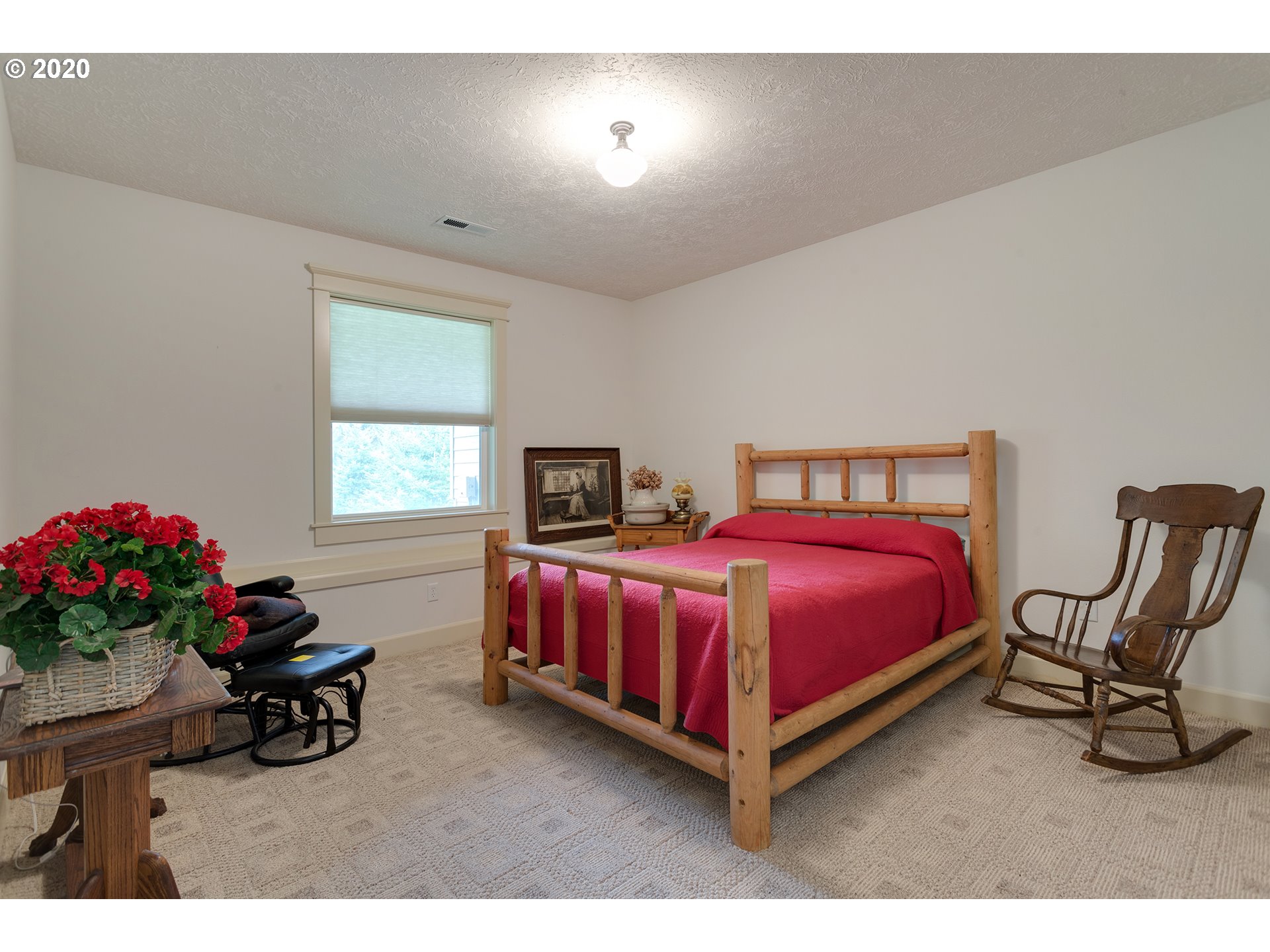 37220 Southeast Bluff Road Boring, OR 97009 - Photo 14 of 26 a bedroom with a bed and window